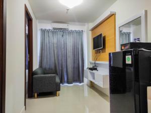 Homey and Comfy 2BR at Vida View Apartment By Travelio
