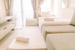 Simple and Cozy Living Studio Room at Poris 88 Apartment By Travelio