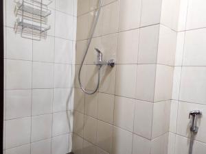 Comfy Studio at Vida View Makassar Apartment By Travelio