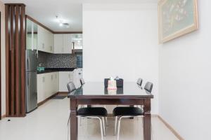 Best Mordern and Homey 2BR Apartment at Casa Grande Residence By Travelio