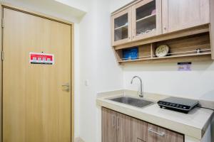 New Furnished and Comfy 2BR at Meikarta Apartment By Travelio
