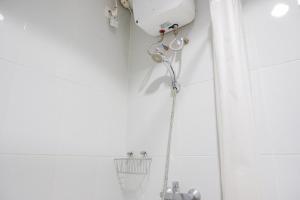 Nice and Cozy Studio Room at Casa De Parco Apartment By Travelio