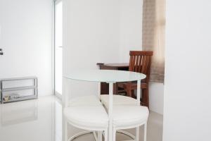 New and Simply Studio at Urbantown Serpong Apartment By Travelio