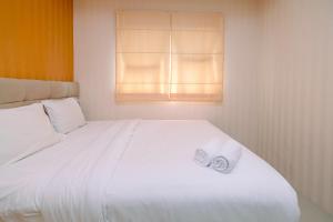 Comfort and Cozy 2BR at Signature Park Grande Apartment By Travelio