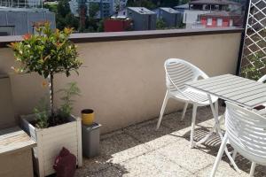 Appartements Appartement chaleureux avec terrasses : photos des chambres