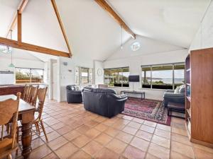 Pelicans View a Riverside Retreat