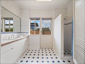 Pelicans View a Riverside Retreat