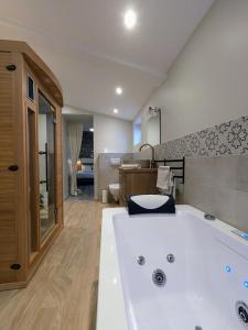 Appartements Le Boheme, sauna & spa : photos des chambres
