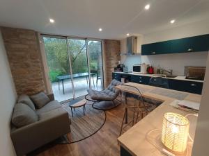 Maisons de vacances le petit moulin de Kerloroc : photos des chambres