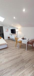 Appartements Studio entre foret et lac : photos des chambres