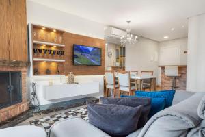 Loft central para família by Achei Gramado