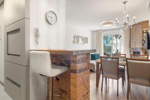 Loft central para família by Achei Gramado