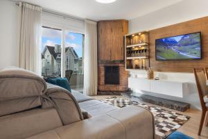 Loft central para família by Achei Gramado