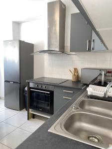 Appartements La Belle Licorne : photos des chambres