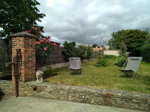 Maisons de vacances Gite ARDELAY et son jardin, 10 min du Grand Parc : photos des chambres