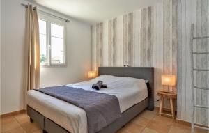 Maisons de vacances Beautiful Home In St-Paulet-De-Caisson : photos des chambres