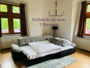 Burg Aue- Ferienwohnungen Erzglück - Familien - im Grünen - zentral