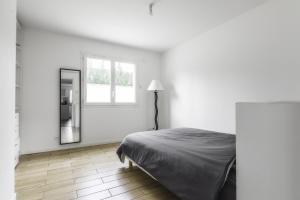 Appartement de 70 m2 dans maison comptenporaine