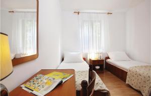 Nice Apartment In Rabac With Kitchen