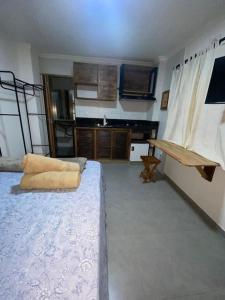 Suíte com copa Casa 364 em Santos