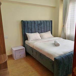 Enzi heights luxurious 2 bedroom furnished and serviced apartment with a pool,gym and playground