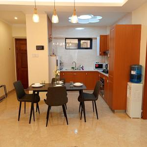 Enzi heights luxurious 2 bedroom furnished and serviced apartment with a pool,gym and playground