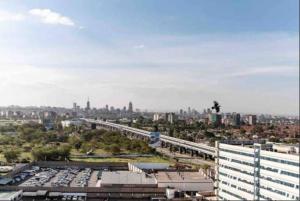 Enzi heights luxurious 2 bedroom furnished and serviced apartment with a pool,gym and playground