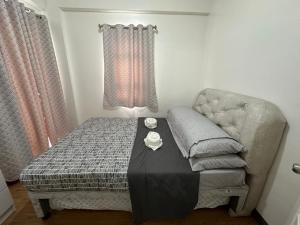 Cozy Condo Almond drive 1BR Talisay SRP w pool