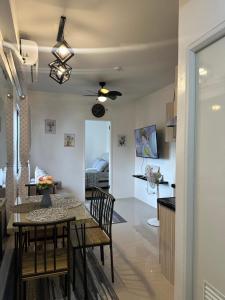 Cozy Condo Almond drive 1BR Talisay SRP w pool