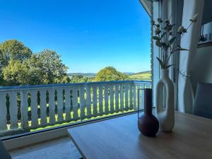 Bovenappartement in Winterberg met balkon en uitzicht over het bos