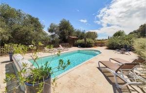 Maisons de vacances 5 Bedroom Beautiful Home In Ouveillan : photos des chambres