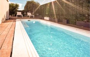 Maisons de vacances Lovely Home In Villelongue-De-La-Sal : photos des chambres