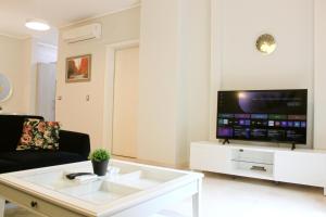 Private Garden 1BR Apt in Palm Hills AUC New Cairo