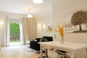 Private Garden 1BR Apt in Palm Hills AUC New Cairo