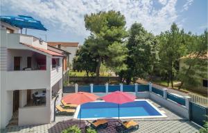 Four-Bedroom Holiday Home In Pakostane