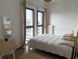 Appartements Appartement proche de la gare - 80m2 : photos des chambres