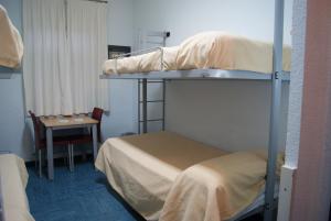 Quadruple Room with Private Bathroom room in Albergue Inturjoven Huelva