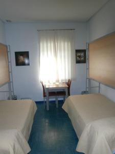 Triple Room with Private Bathroom room in Albergue Inturjoven Huelva