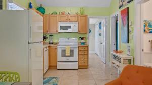 The Mellow Macaw by Last Key Realty