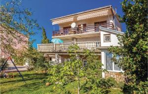 Amazing Apartment In Novi Vinodolski With Kitchen 