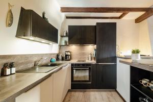 Appartements Escapade medievale Charme et Authenticite : photos des chambres