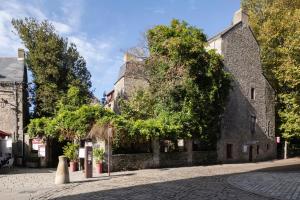 Appartements Escapade medievale Charme et Authenticite : photos des chambres