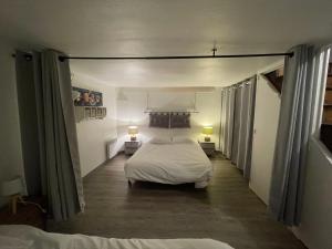 Maisons de vacances Plage et commerces a 50m, sans tele pour deconnecter ! : photos des chambres