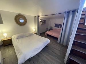 Maisons de vacances Plage et commerces a 50m, sans tele pour deconnecter ! : photos des chambres