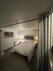 Maisons de vacances Plage et commerces a 50m, sans tele pour deconnecter ! : photos des chambres