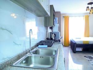 Blue Marlin Studio Cribz Stade view Suites