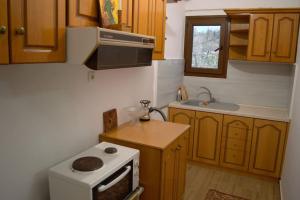 Παραδοσιακο σπιτι με εσωτερικο τζακι