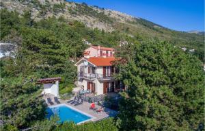 Amazing Home In Plomin With Kitchen