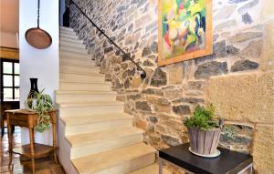 Maisons de vacances 4 Bedroom Gorgeous Home In Marguerittes : photos des chambres