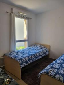 Appartements La Petite Cigale, grand balcon a 10min du Circuit Paul Richard et 15min de la mer - By AURAconciergerie : photos des chambres